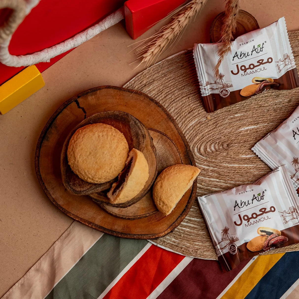 Mini packs of Medjool maamoul in bowl with colorful mat Elsouk