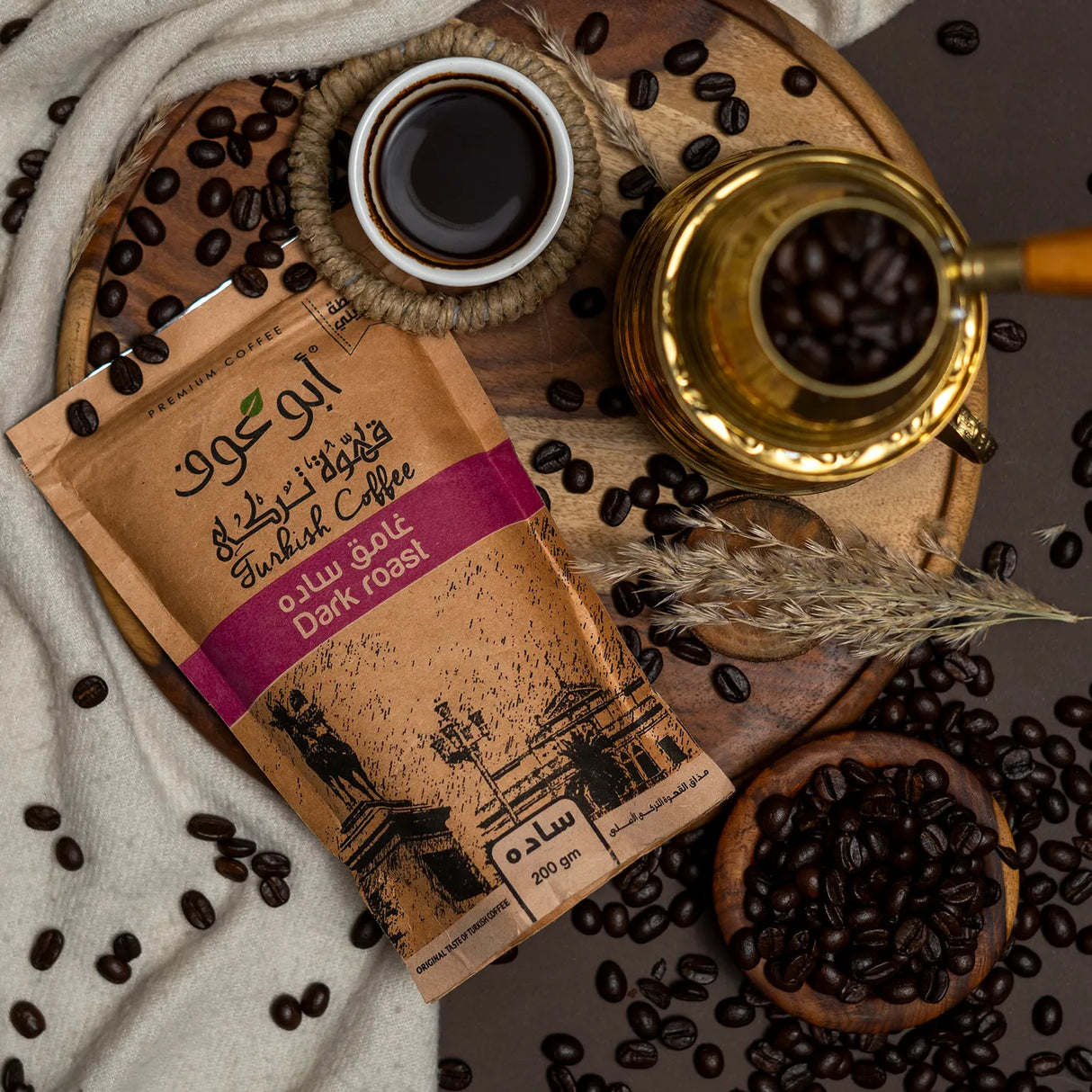 Dark roast Shakk Coffee with whole beans and serving setup Elsouk