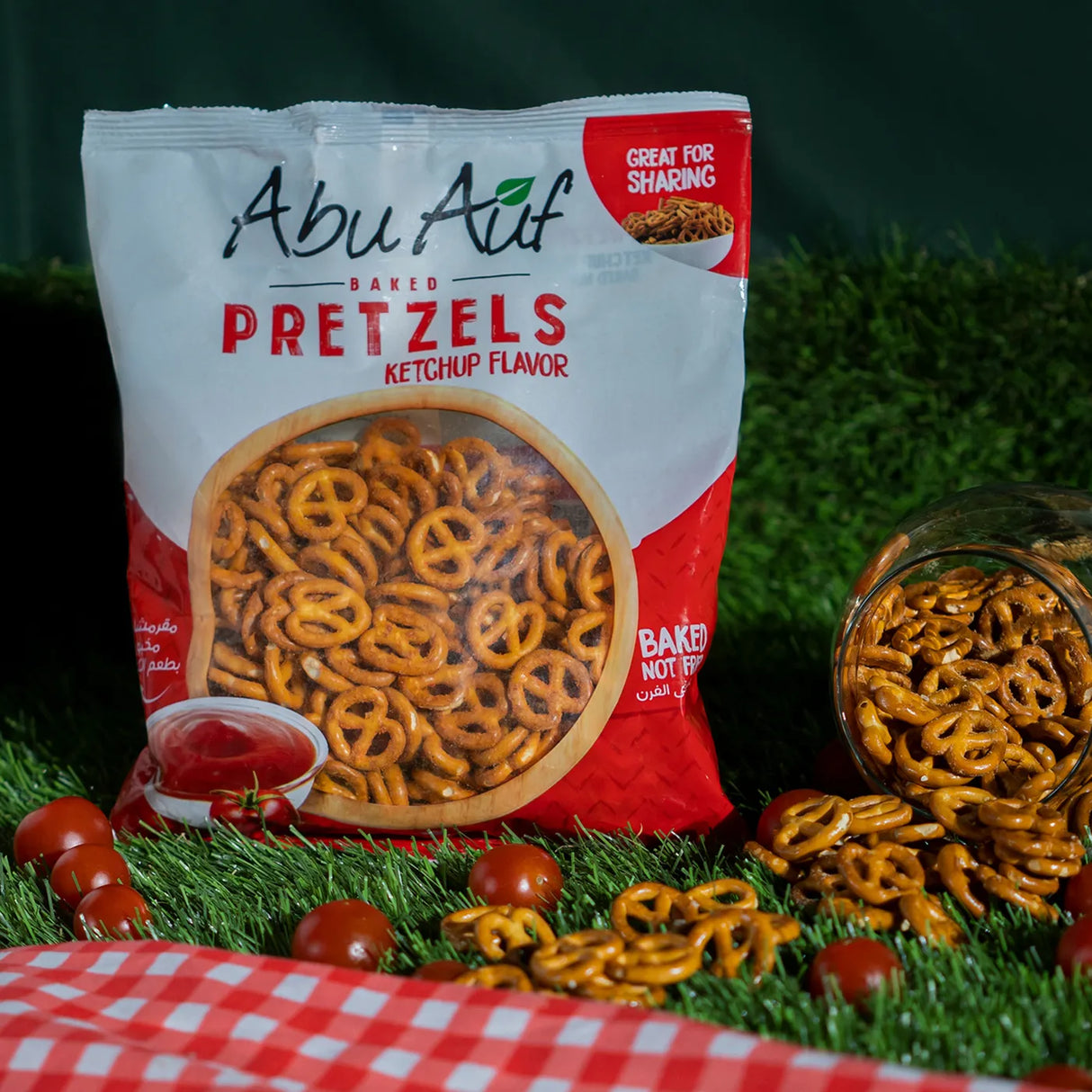 Baked Pretzels ketchup snack with cherry tomatoes on grass at Elsouk