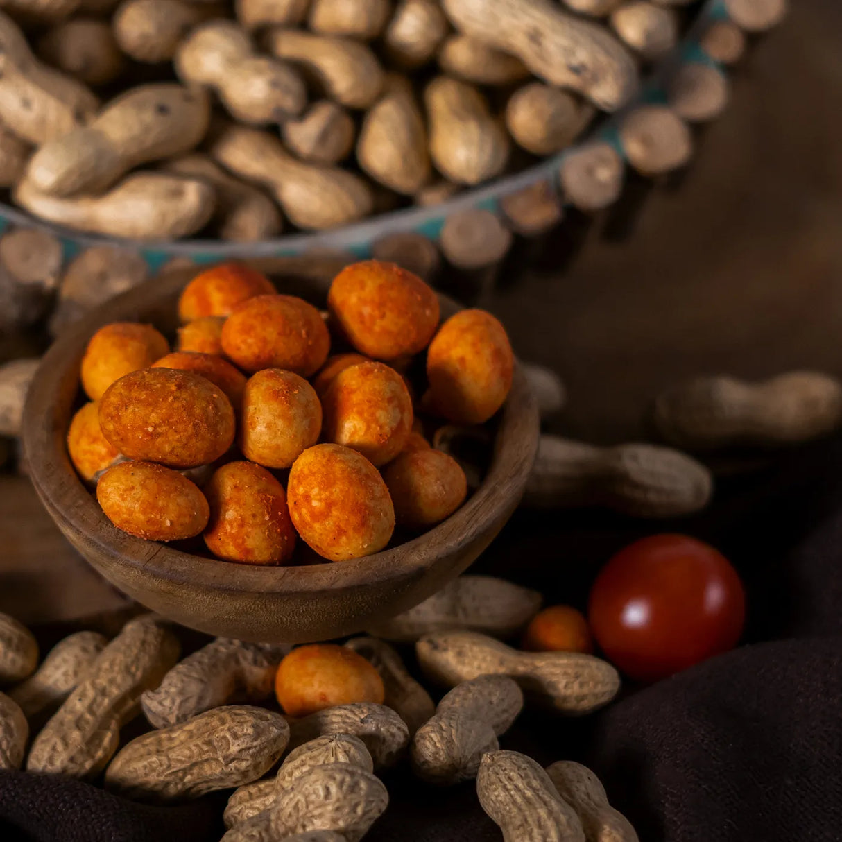 Side view of Krikri ketchup peanuts in wooden bowl by Elsouk