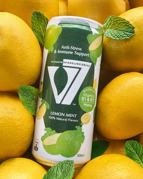 V7 Lemon Mint sparkling drink 300ml bottle with lemon and mint flavor, clear carbonated beverage in a transparent plastic container.