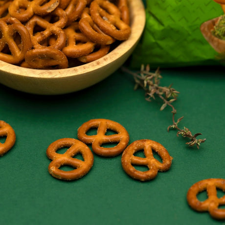 Cheese flavored pretzels in bowl with herb styling at Elsouk