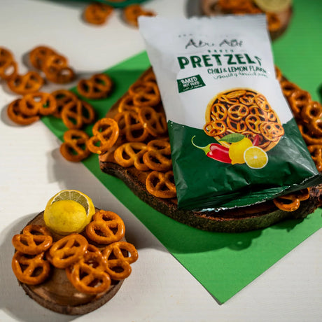Chili lemon pretzels placed with lemon and red chili garnish Elsouk