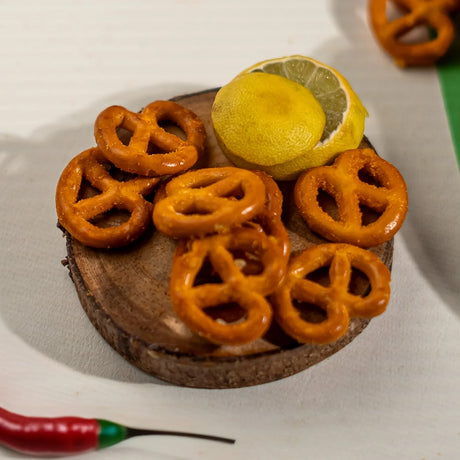 Closeup of chili lemon pretzels with whole lemon and chili Elsouk22