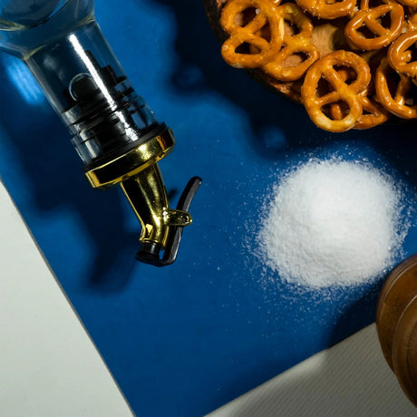 Salt and pepper pretzels styled with glass bottle from Elsouk