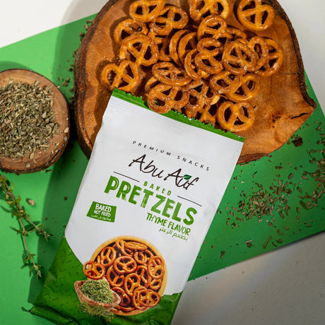 Abu Auf thyme pretzels scattered with thyme leaves near pack Elsouk