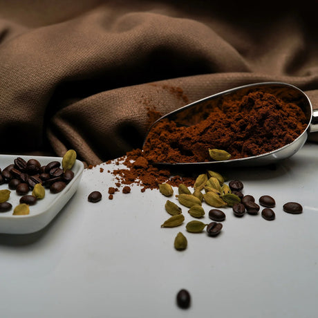 Coffee beans and ground medium roast closeup for product Elsouk