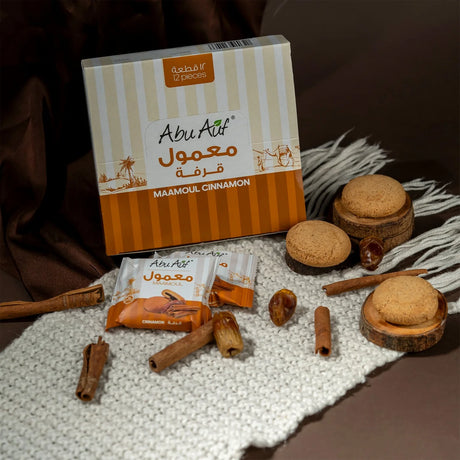 Abu Auf Maamoul with Dates and Cinnamon, 12-piece treat box, featuring traditional Middle Eastern pastry with rich dates and cinnamon flavor.