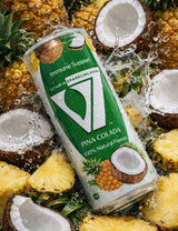 V7 Piña Colada Sparkling Drink 300ml bottle with vibrant pineapple and coconut flavor label, carbonated beverage in clear glass