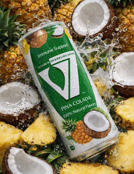 V7 Piña Colada Sparkling Drink 300ml bottle with vibrant pineapple and coconut flavor label, carbonated beverage in clear glass