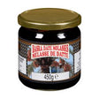 Bottle of Basra Date Molasses in 450g size, dark syrup made from dates, shown in a clear container with a dark, rich appearance.