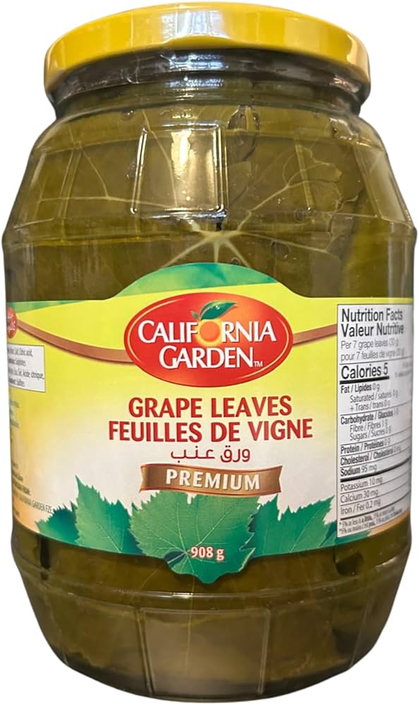 Fresh California Garden grape leaves for cooking and stuffing, shown in a close-up image of vibrant green leaves.