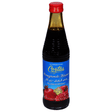 Cortas pomegranate molasses bottle with label, showing dark red, thick syrup used in cooking and baking.