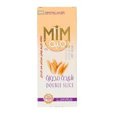 Jar of MIM 100% natural sugar wax hair remover with a wooden spatula on a white background, ready for hair removal.