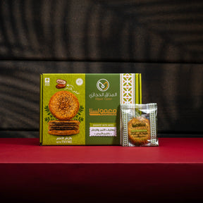 Tamriati Rahayef Dates with Thyme and White Wheat, 450g, showing a close-up of the date rolls with thyme and wheat filling