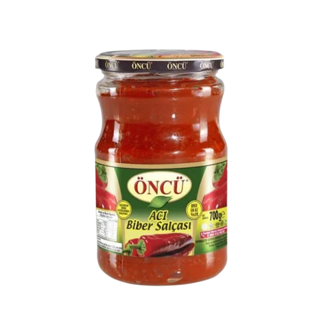 Spicy hot pepper paste in a jar by Oncu, showcasing bright red, chunky chili paste for cooking and flavoring dishes.
