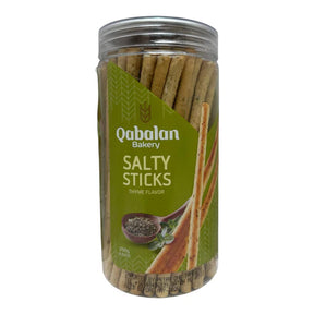 Qabalan salty sticks with thyme flavor, crispy breadsticks arranged in a bowl, showcasing their golden-brown texture and herbal seasoning.