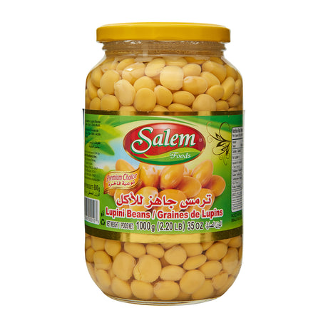 Pickled Salem Lupini Beans in a bowl, showcasing the green beans immersed in brine, ready to enjoy as a snack or appetizer.