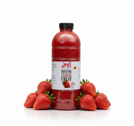 Drips Strawberry Chunky Smoothie in a clear glass, showcasing fresh strawberry chunks and vibrant red color, natural fruit juice.