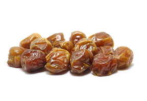 Golden Pyramids Sukkari Rotab Dates in a clear container, showcasing glossy, sweet, moist Sukkari dates perfect for snacking or desserts.