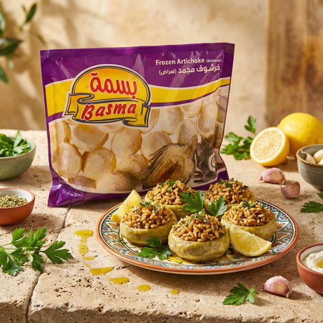 Frozen artichoke by Basma, showing fresh, frozen artichoke hearts in a clear container with green leaves and ice crystals.
