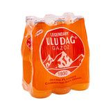 Bright yellow bottle of Uludag Legendary Uludag Gazoz soft drink with colorful label and Turkish branding.